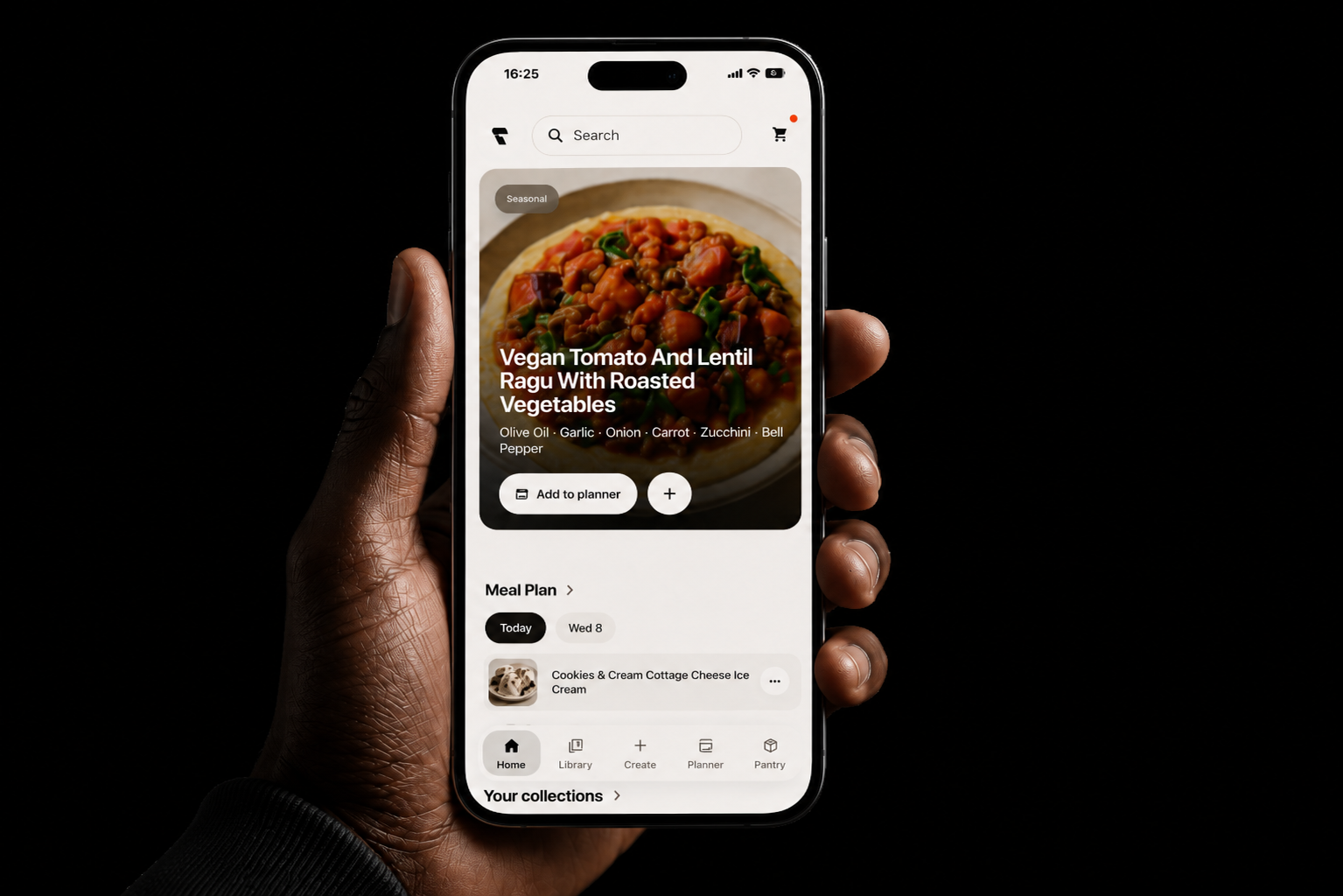 Flavi app home screen showing a suggested Vegan Tomato and Lentil Ragu recipe, held in hand